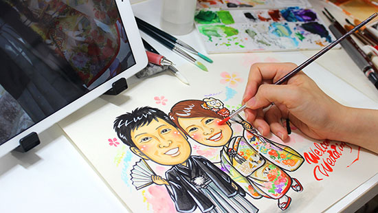 似顔絵なつみかんのイラストを作成している写真