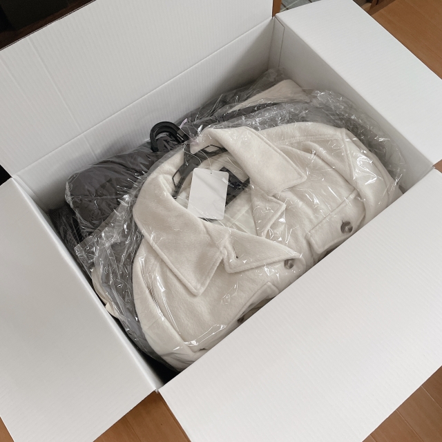 段ボールに入ったクリーニング商品の写真